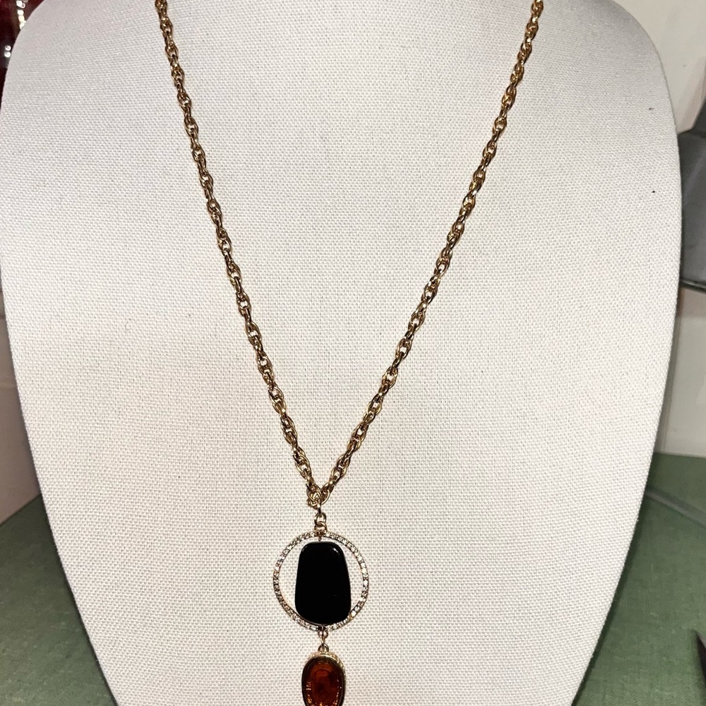Gold and Black Necklace with Elegant Pendant Design